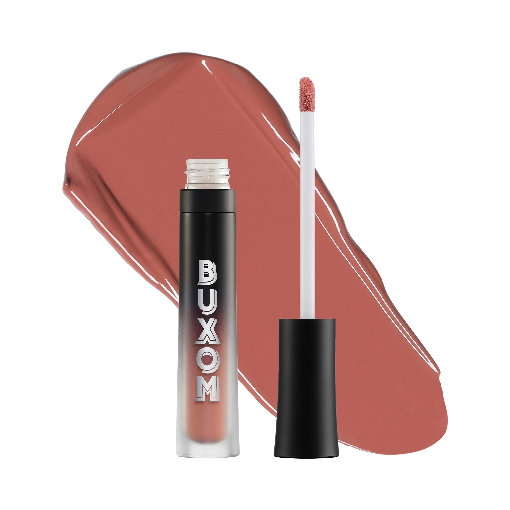 Buxom Full-On Angel Baby lipstick tube close-up showing rich color.