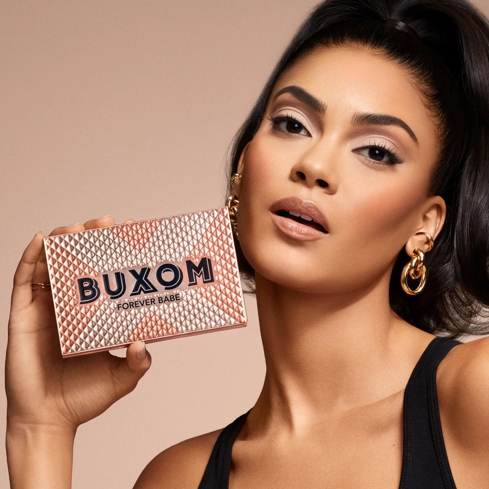 Buxom Iconic Nudes compact with mirror for on-the-go touch-ups.