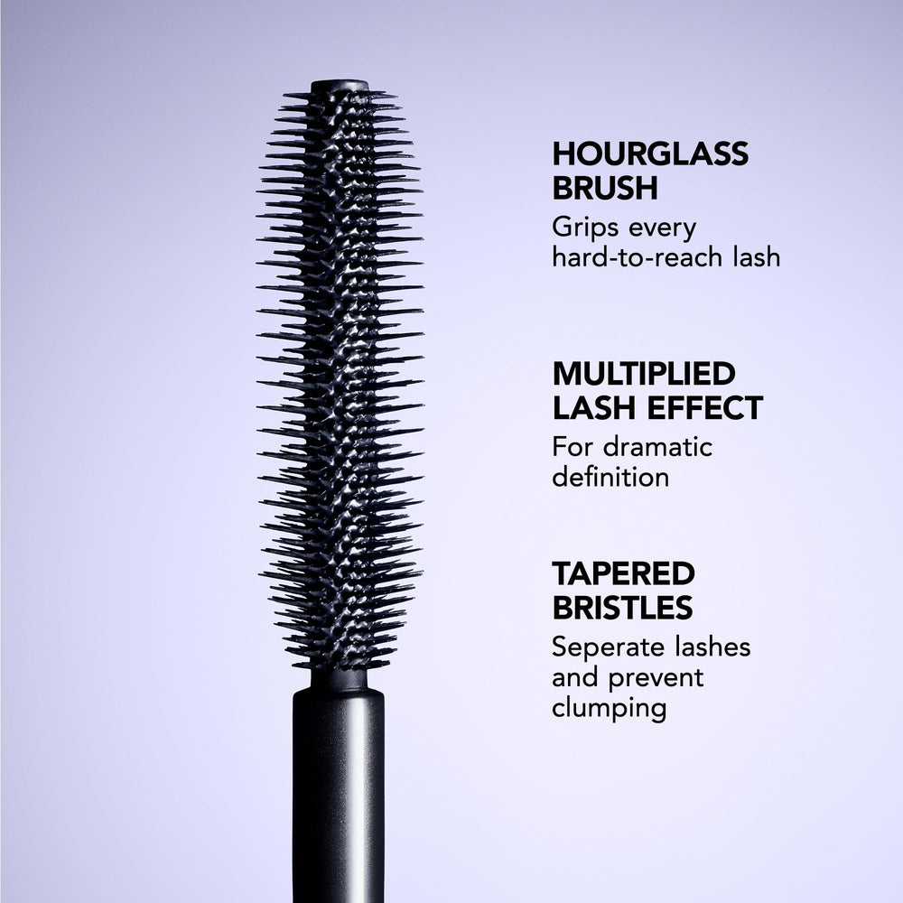 Travel-size mascara tube designed for quick, on-the-go touch-ups.
