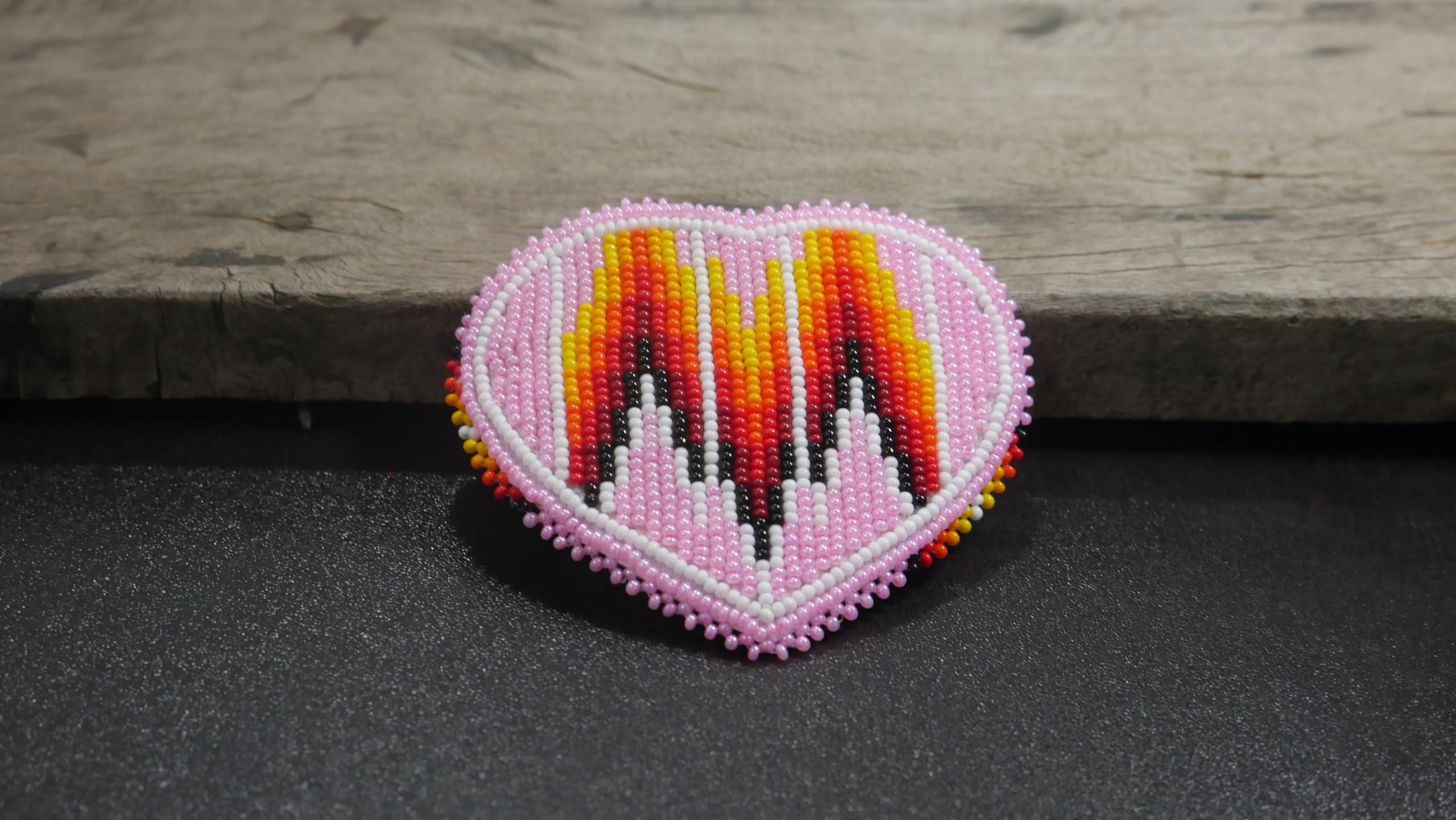 BuyBeaded multicolor bead pattern clip brings vibrant detail to your look.