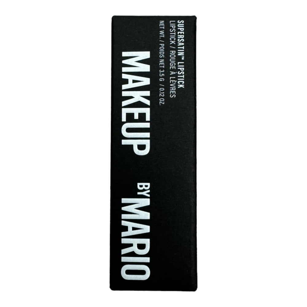 By Mario Rockefeller lipstick swatch on lips shows creamy satin finish.