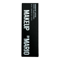 By Mario Rockefeller lipstick swatch on lips shows creamy satin finish.