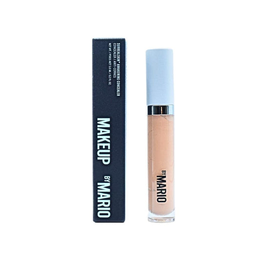 BY MARIO SurrealSkin Awakening Concealer bottle demonstrates easy application for long-lasting coverage.