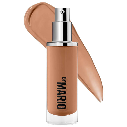 BY MARIO SurrealSkin 16C bottle front view for radiant, buildable coverage.