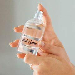 By Rosie Jane Dulce travel size bottle, perfect for on-the-go refreshment.