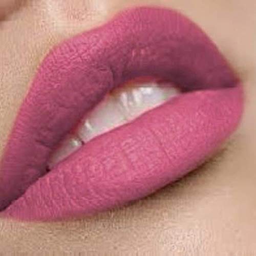 By The Clique premium fuchsia pink lipstick close-up for bold evening looks.