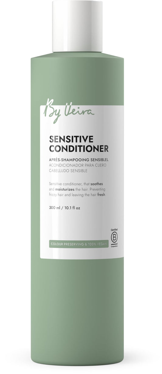 By Veira Sensitive Conditioner bottle pour soothes itchy scalp and nourishes hair.
