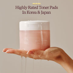 Close-up of ByUR Vita Giving Keep Radiance toner pad soaked in hydrating essence.
