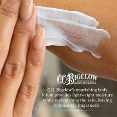Close-up of Bergamot Body Lotion cream texture showing smooth, non-greasy finish