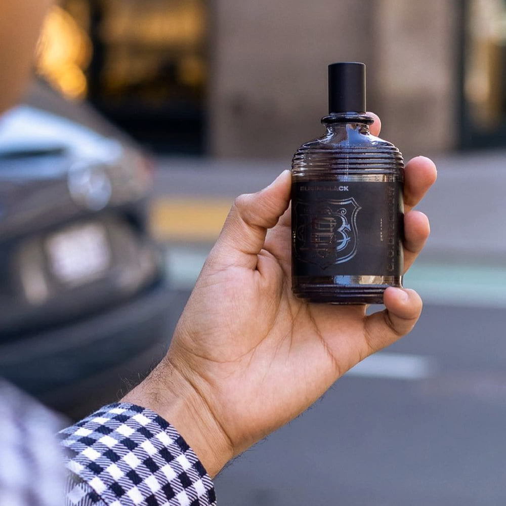 Front label detail emphasizes premium craftsmanship of C.O. Bigelow Elixir Black.