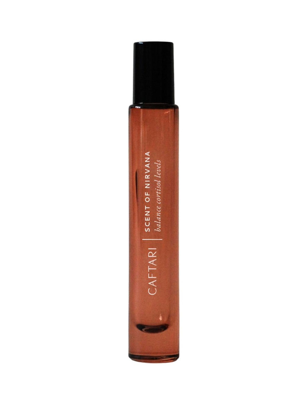 Caftari Oudh Cedarwood Patchouli roll-on close-up for long-lasting fragrance.