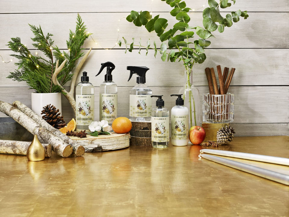 Caldrea Gilded Balsam Birch hand soap on sink adds inviting ambiance.