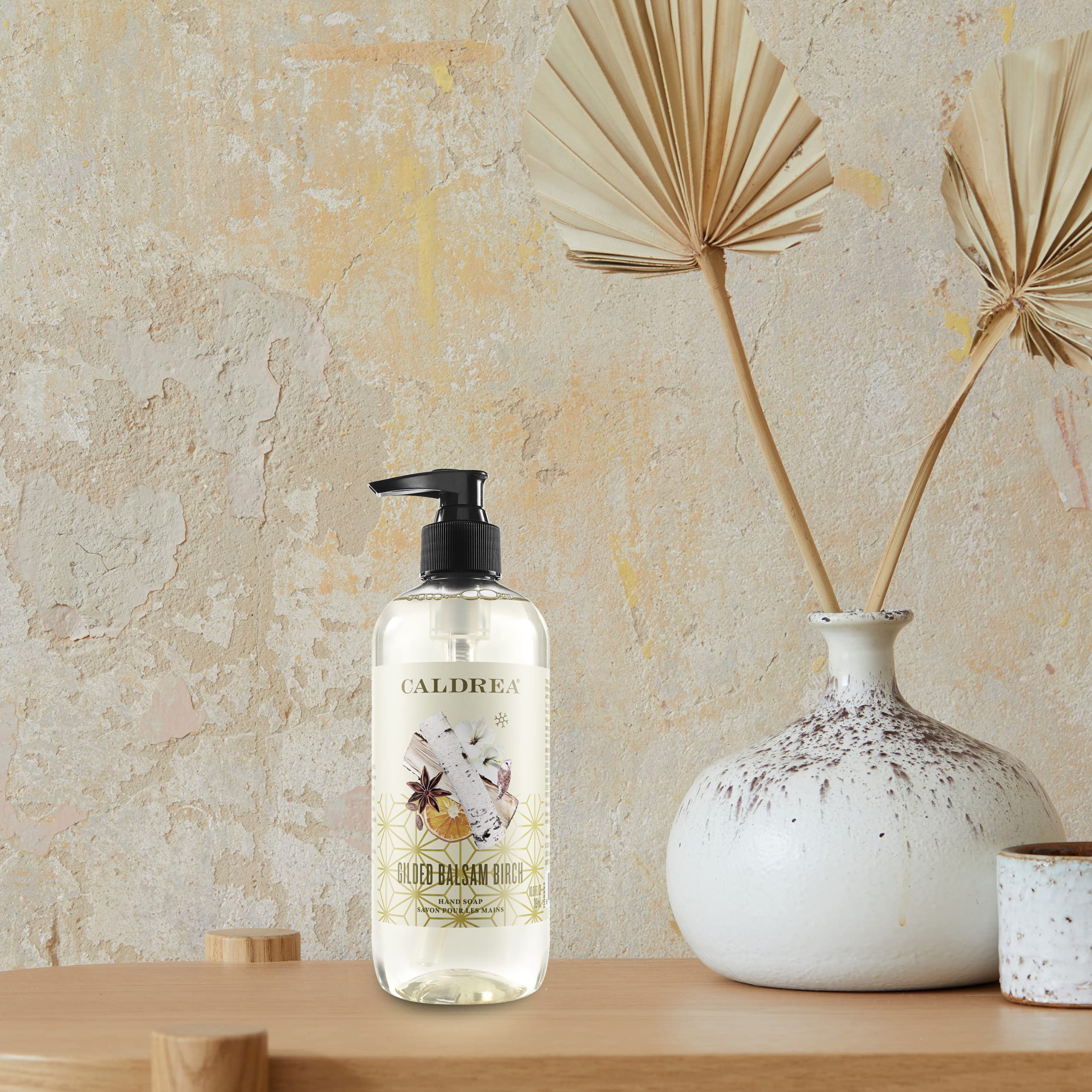 Caldrea Gilded Balsam Birch by sink ideal for hand washing delicate fabrics.