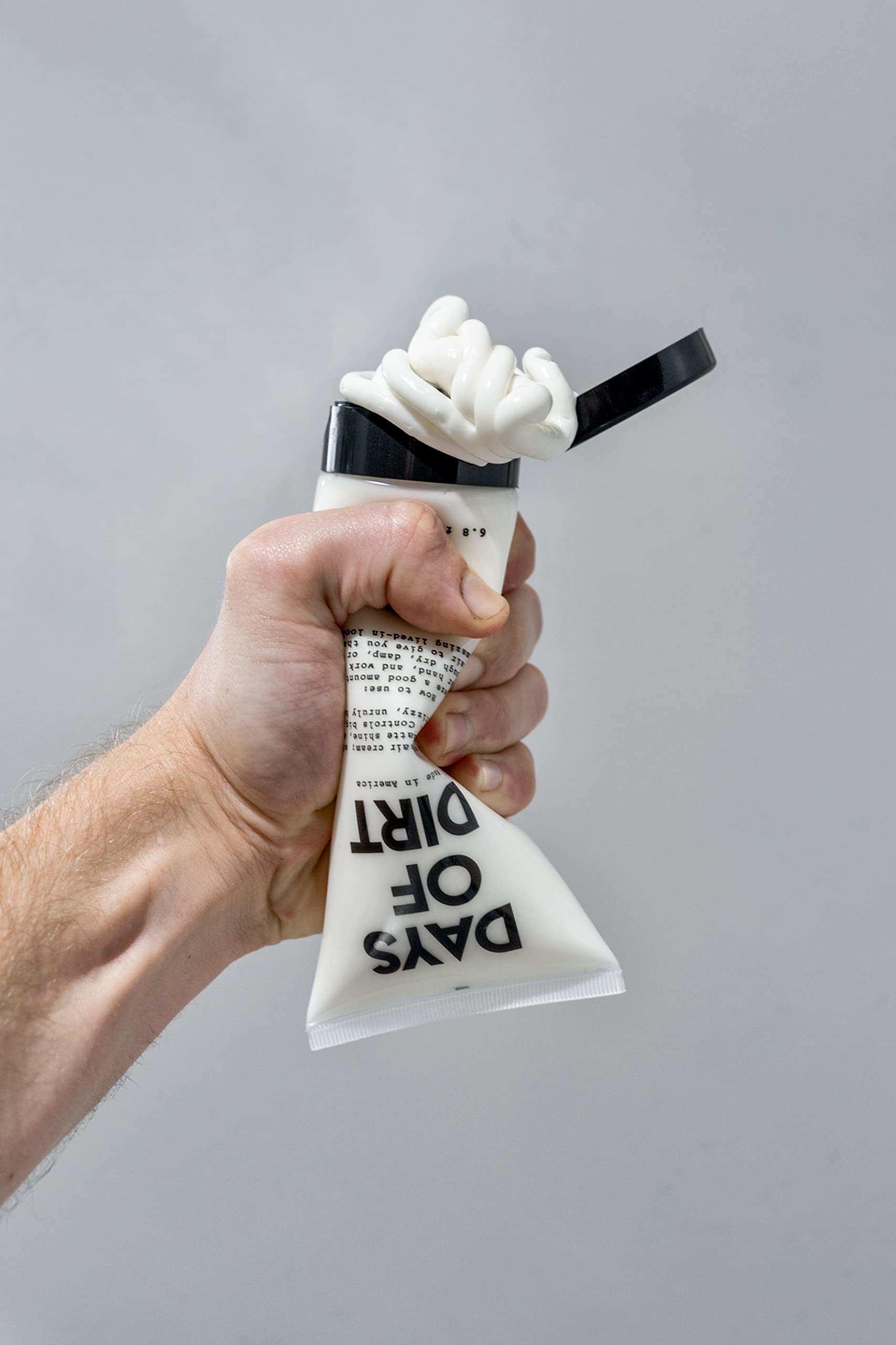 Travel-friendly Days of Dirt tube ready for on-the-go styling.