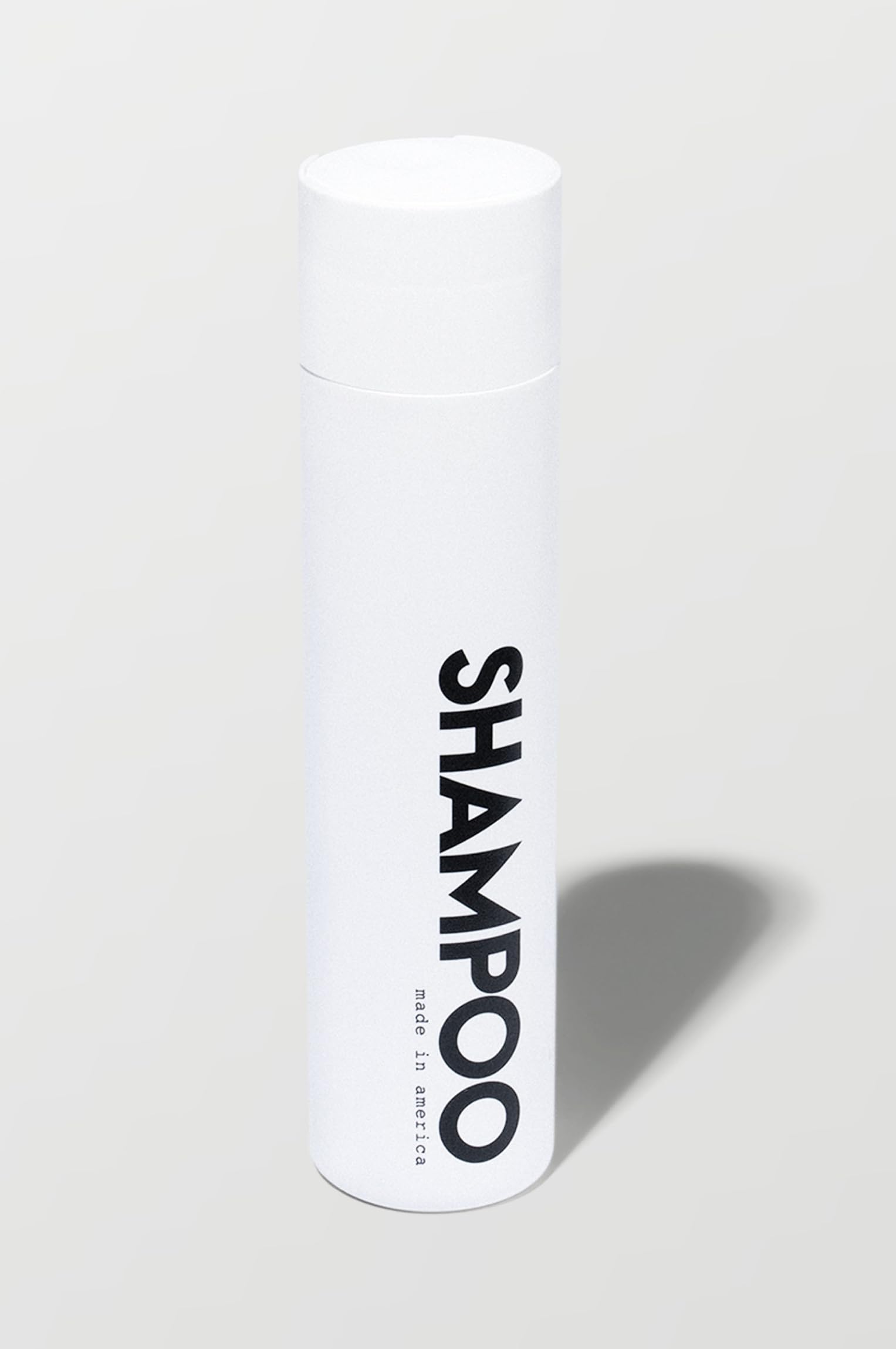 California Born sulfate-free shampoo bottle close-up with beachy coconut scent for all hair types