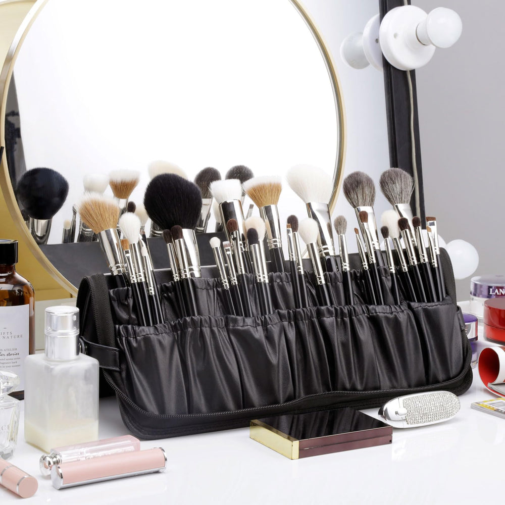 Camdeez Rownyeon artist bag with brushes ready for professional sessions.