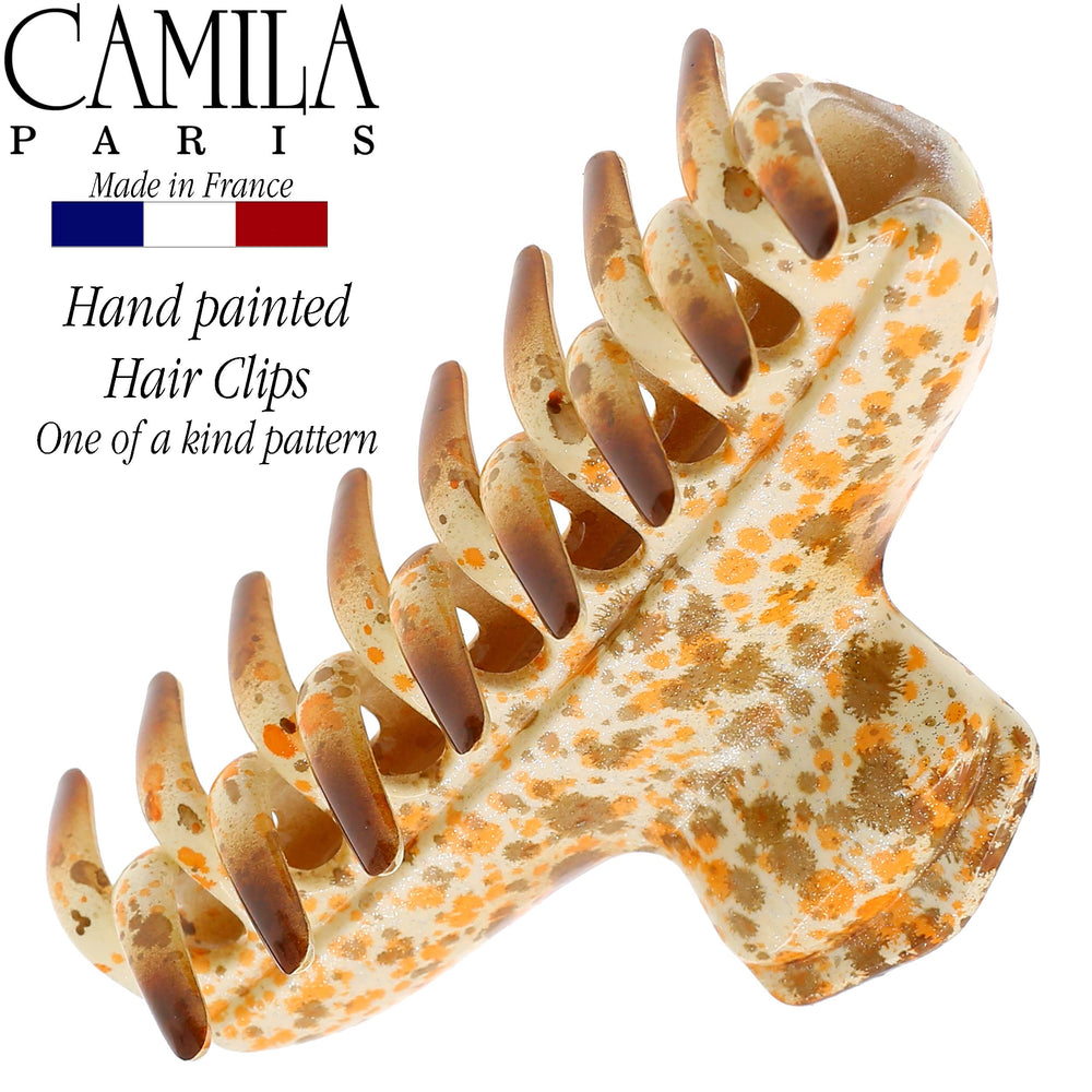 Camila Paris CP3307 orange butterfly clip in hair secures volume with no slip.