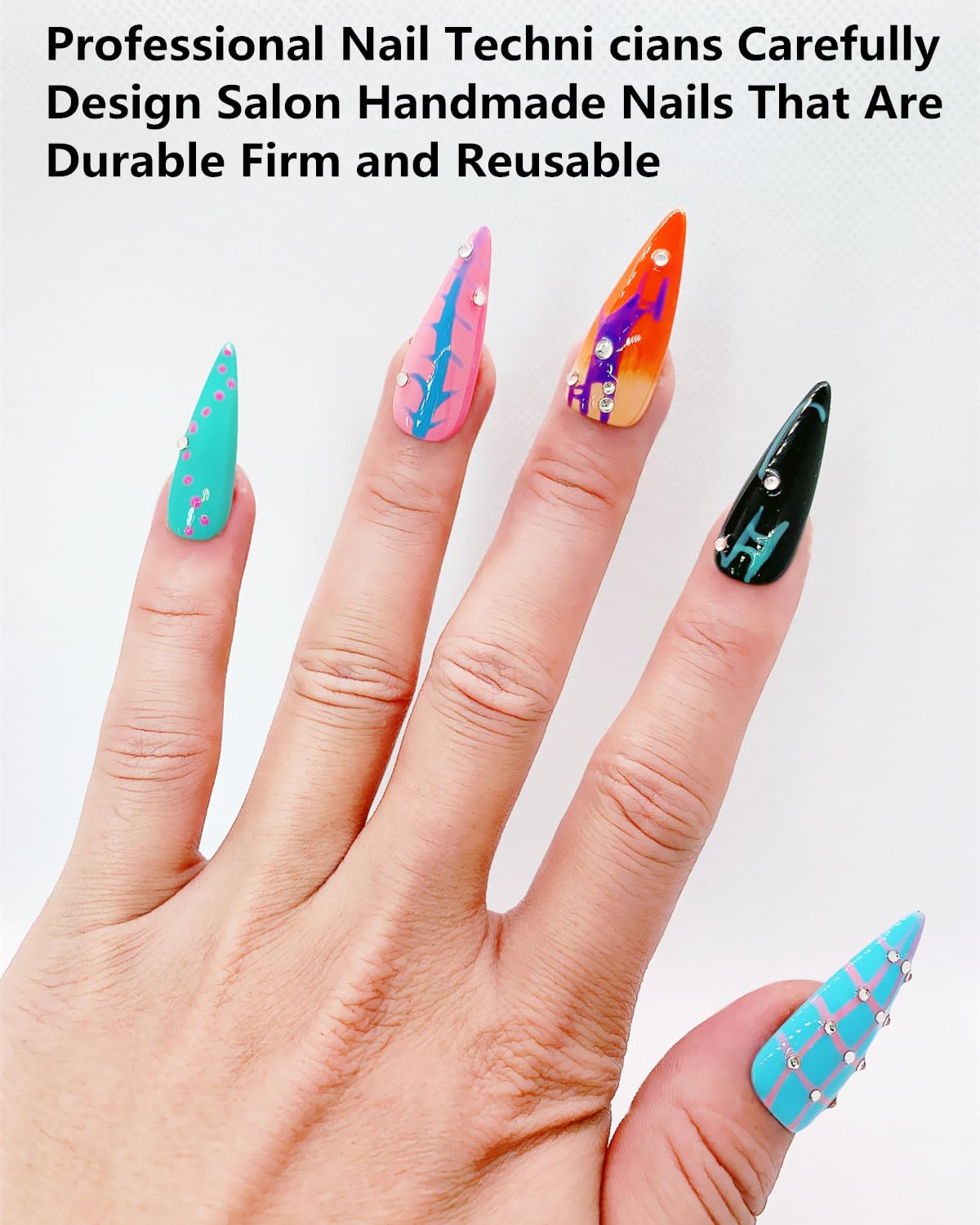 CAMILCY almond-shaped press-on nails with long tips.