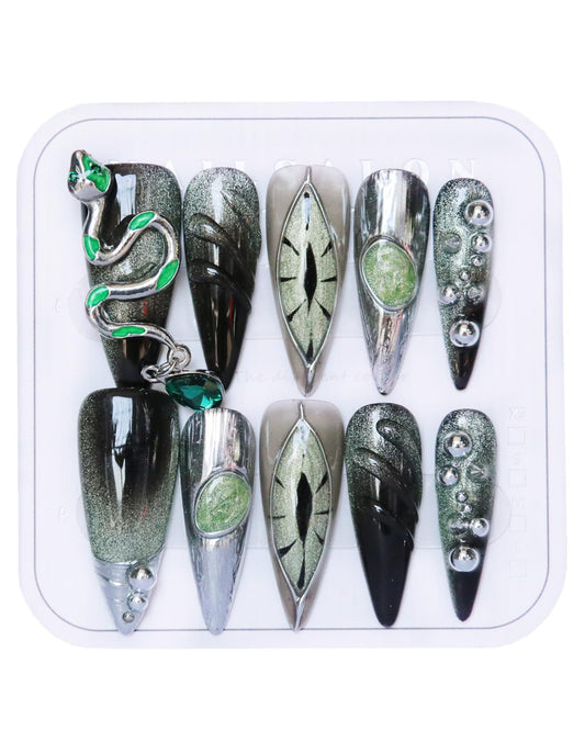 CAMILCY press on nails in long almond shape with black diamonds, hand painted for a bold look.