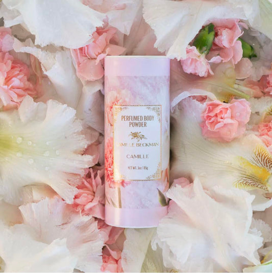 Camille Beckman fragranced talc-free powder dusting action for freshness.