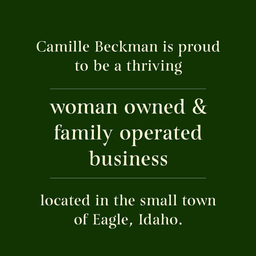 Camille Beckman bottle label shows White Pumpkin Cardamom, a warming seasonal scent.