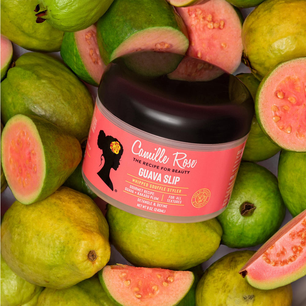 Camille Rose Guava whipped cream bottle-close-up showcases detangling power for busy mornings.
