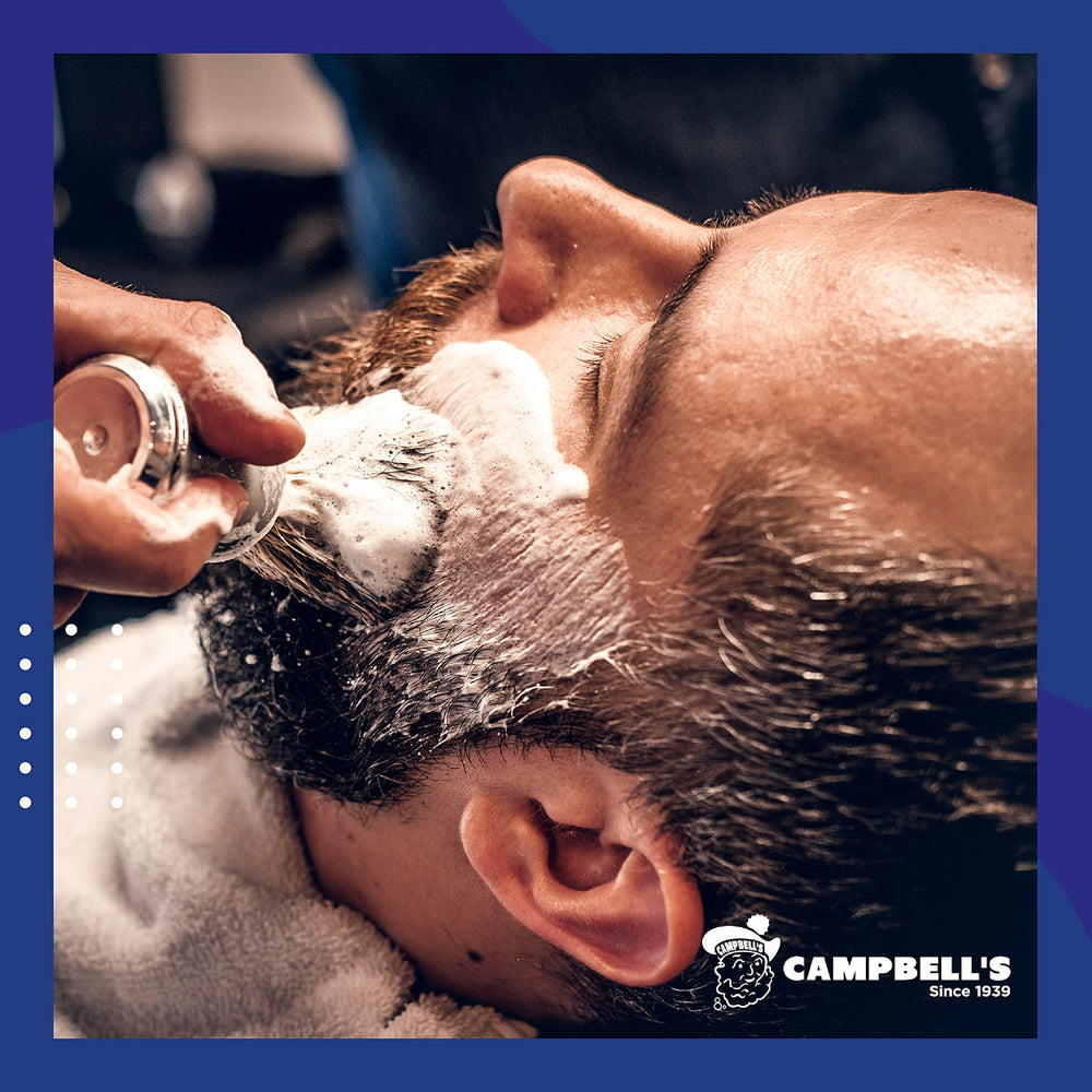 Historical Campbell's brand history dating back to 1939 in a barber setting.