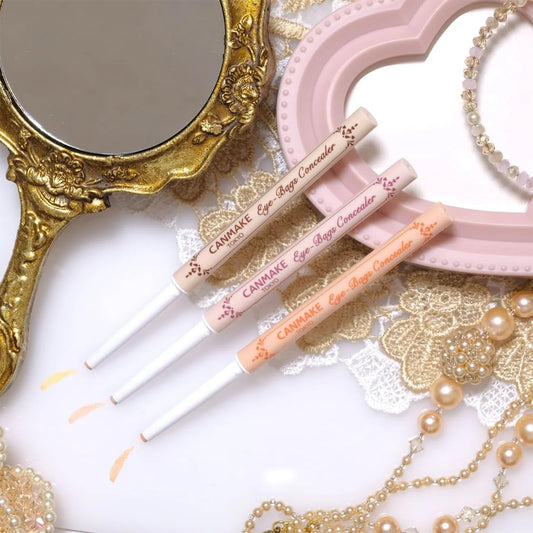 Close-up of CANMAKE concealer texture showing smooth blending.