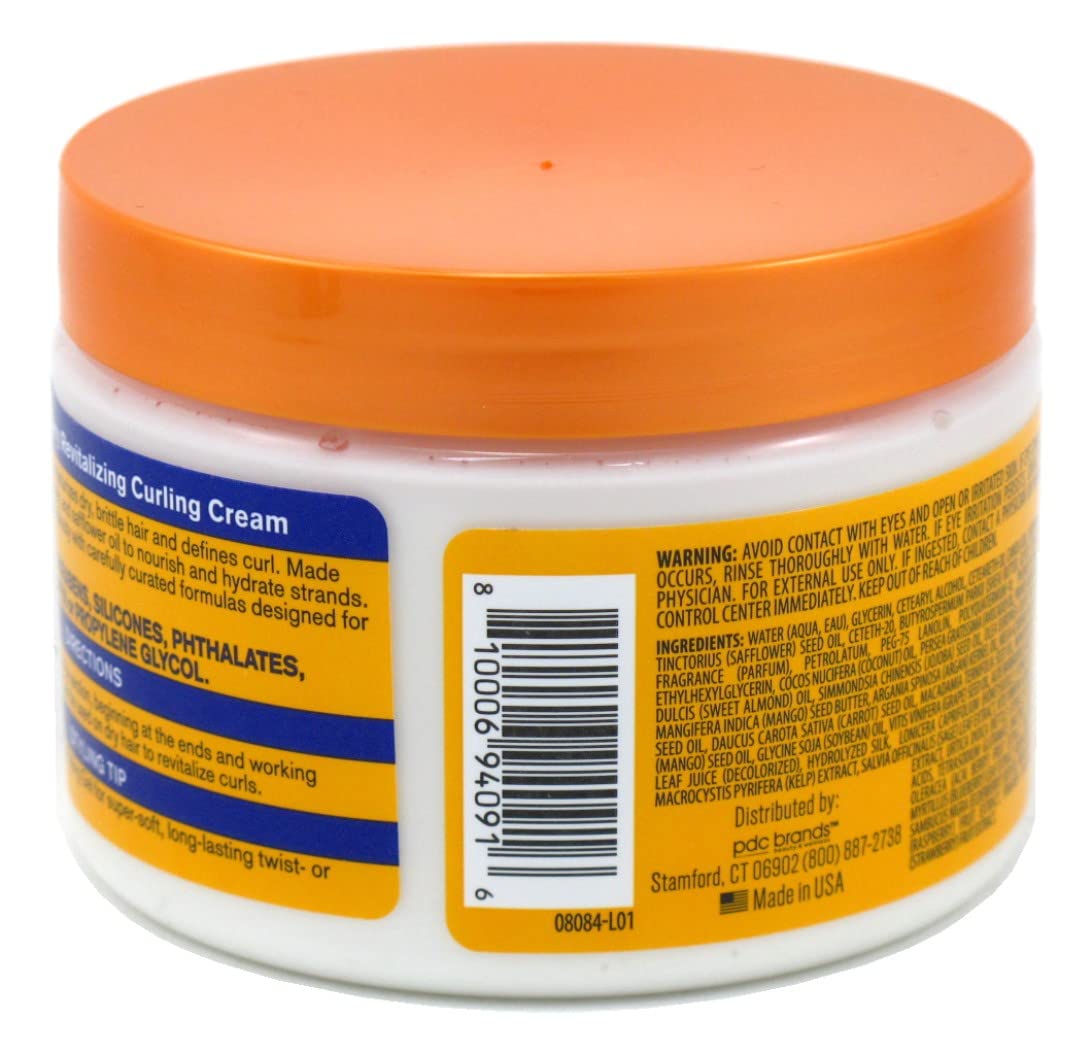 Cantu Acai Berry Curling Cream application smooths curls for definition.