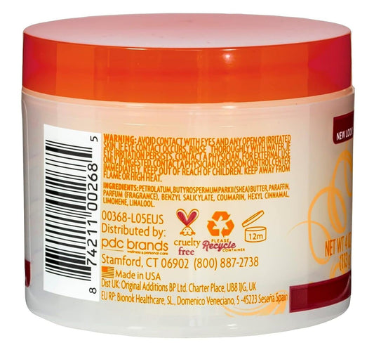 Cantu Shea Butter Pomade creamy texture closeup for smooth, defined styling.