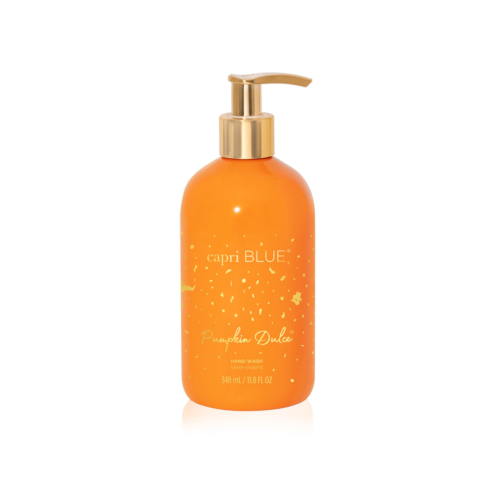 Capri Blue Pumpkin Dulce bottle with pump on counter, showcasing luxe design.