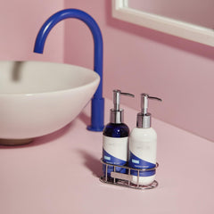 Capri Blue Volcano hand lotion pump close-up showing creamy, fast-absorbing texture.