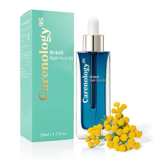 Carenology 95 RE:BLUE Night Oil bottle on nightstand for soothing nightly rituals.