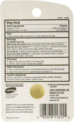 Carmex Classic Lip Balm being applied to lips.