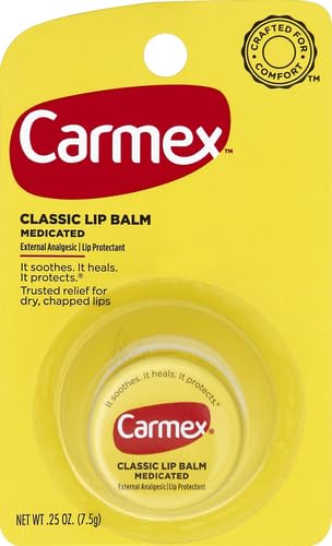 Close-up texture of Carmex Classic Lip Balm on lips.