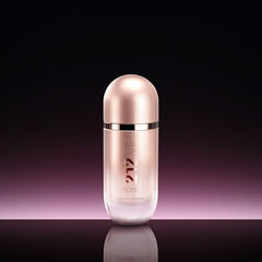 Carolina Herrera 212 VIP Rosé champagne glow and pink accents evoke celebratory style.