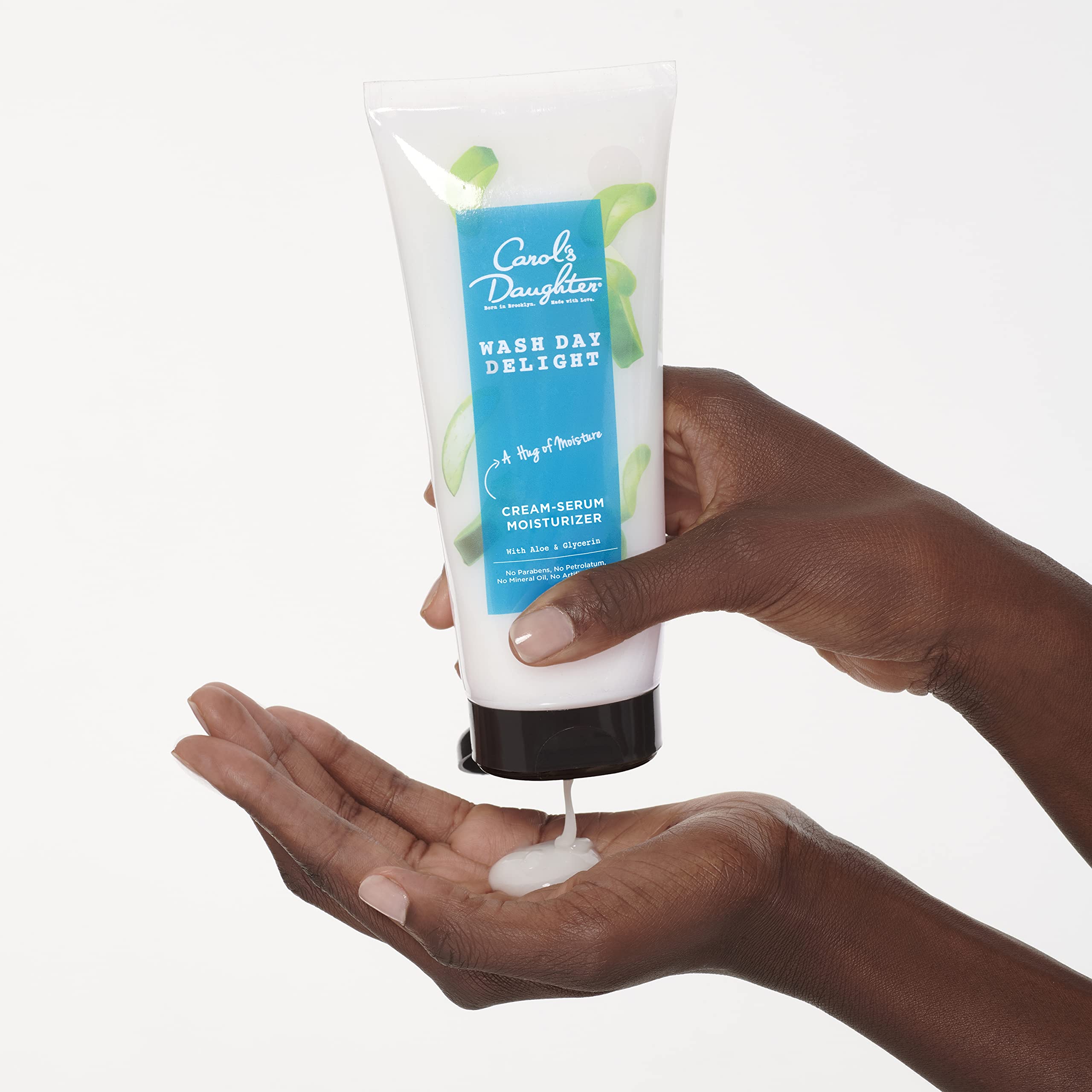 Wash day routine setup featuring Carol's Daughter moisturizer