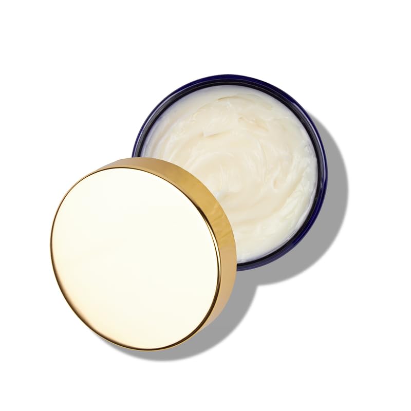 Applying cream with fingertips demonstrates soothing, non-greasy finish.
