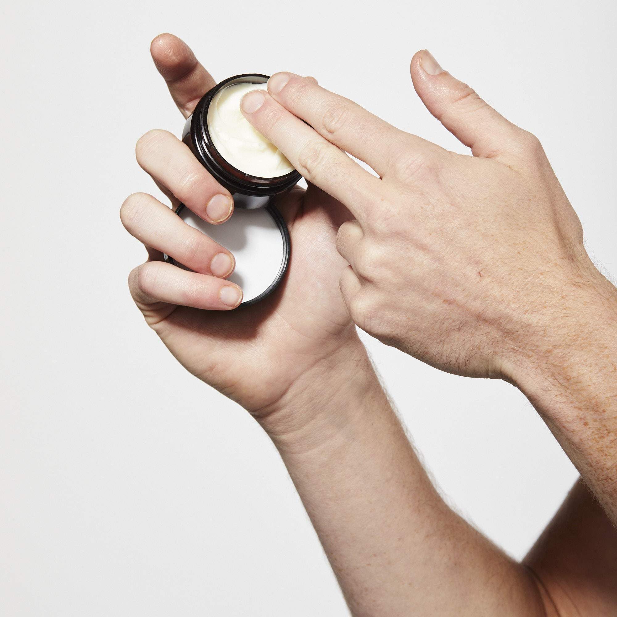 Caswell-Massey Fiber-Style pomade on a comb for a low-shine, natural look.