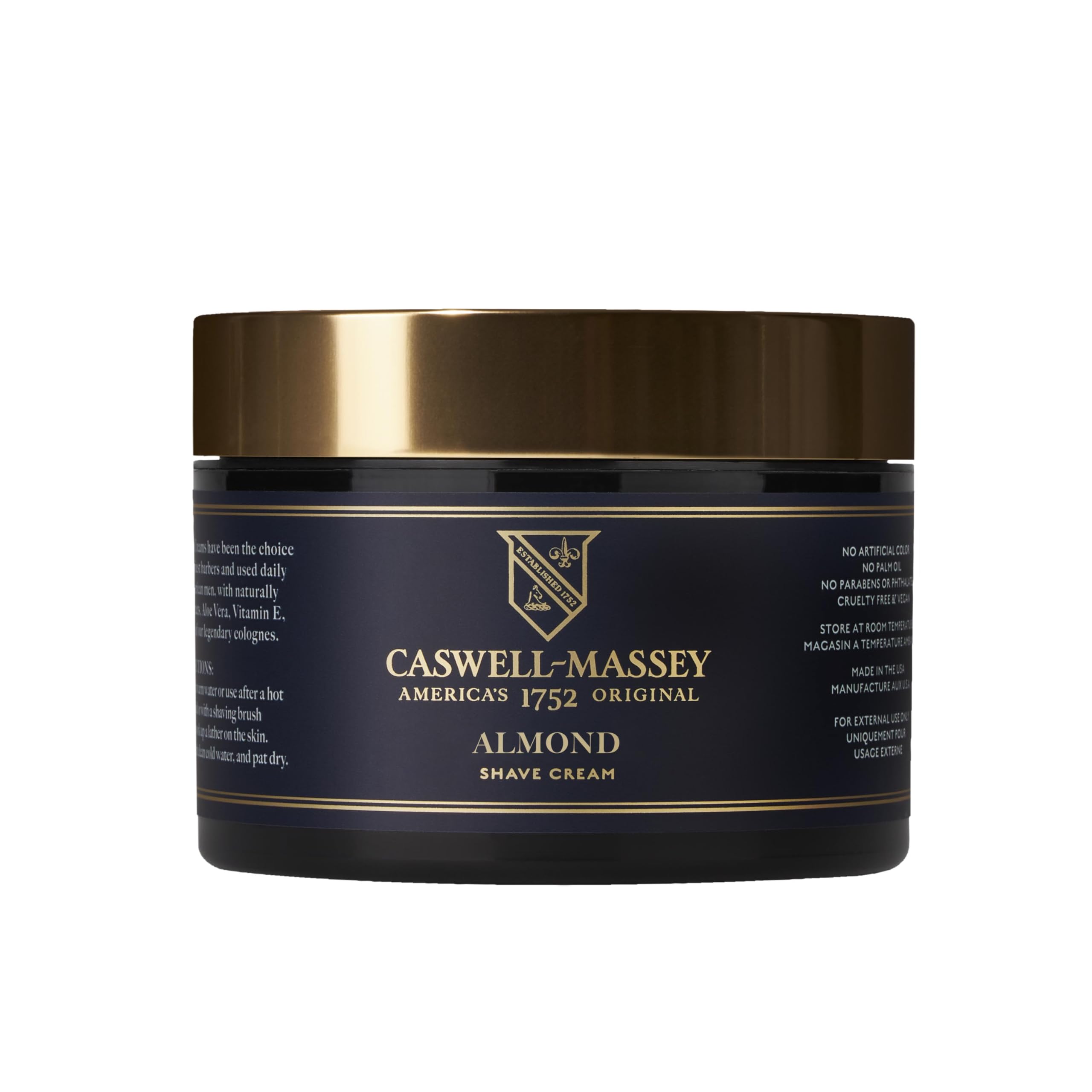 Caswell-Massey Heritage Almond Shave Cream bottle on shelf signals premium grooming.