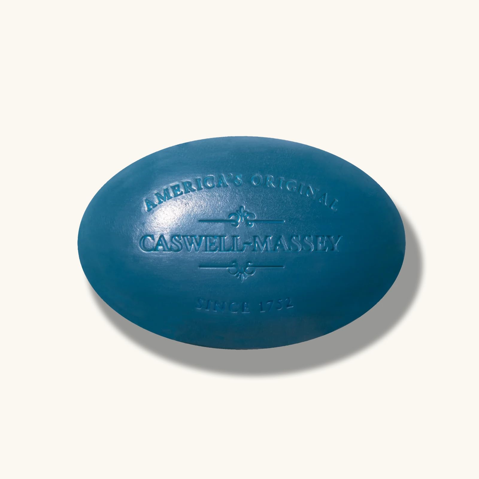 Scent notes of spiced mandarin, lavender, and balsam in Newport soap