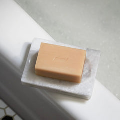 Caswell-Massey oatmeal castile bar highlights plant-based formula for sensitive skin.