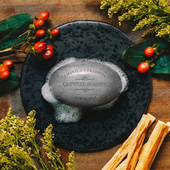 Caswell-Massey sandalwood soap body-use demonstrates versatile application for face and body care.