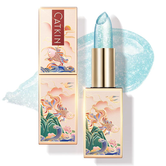 Catkin Mermaid lip balm in couture case with color-changing glow.
