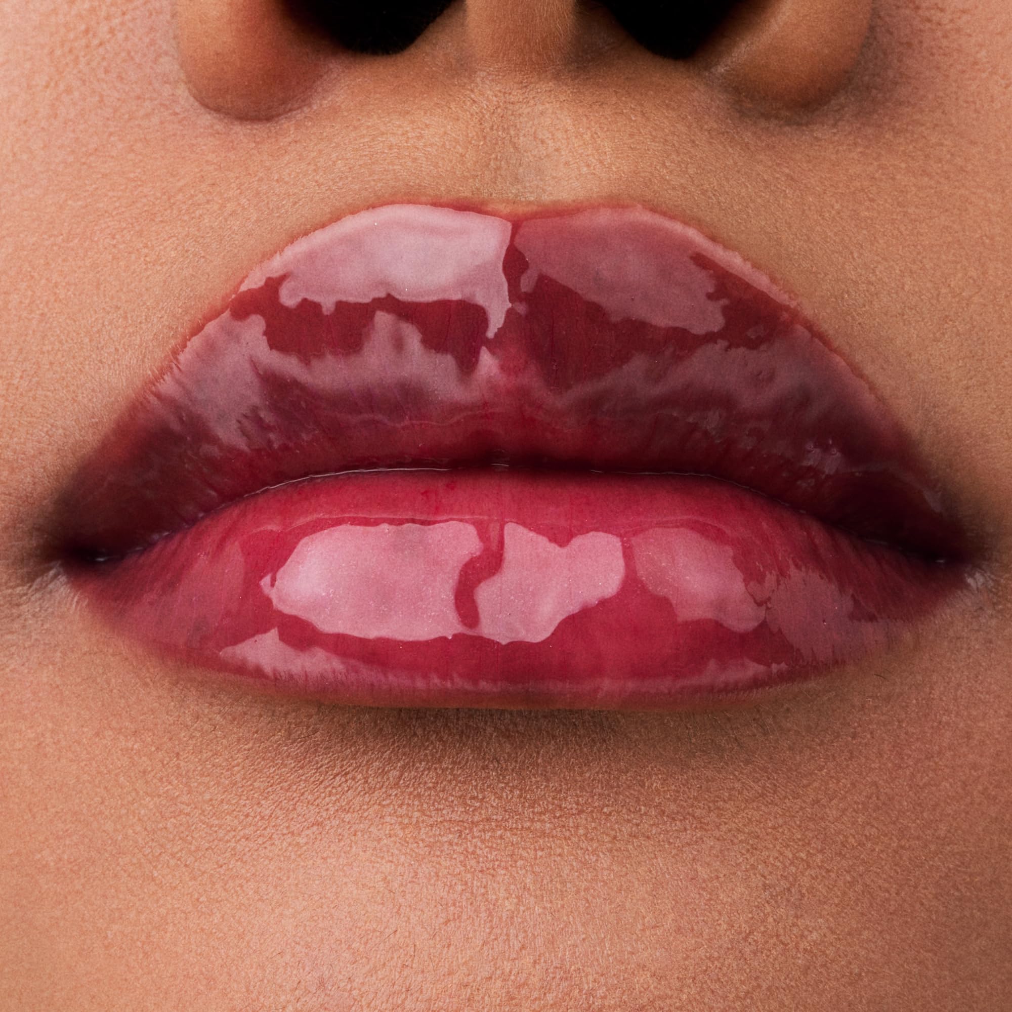 Gift box featuring Catrice Glossin' Glow lip oils, a vegan, cruelty-free limited edition set