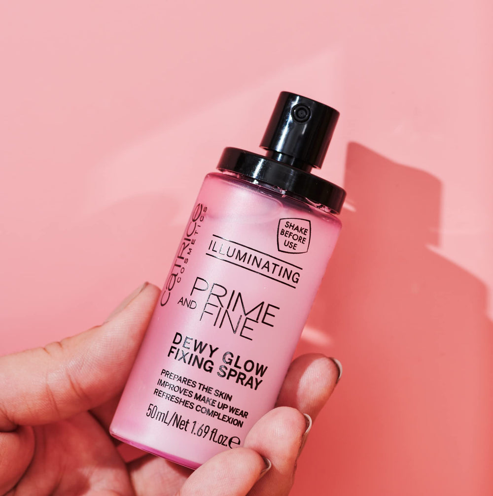 Catrice Prime & Fine dewy glow mist applied for a soft, radiant finish.