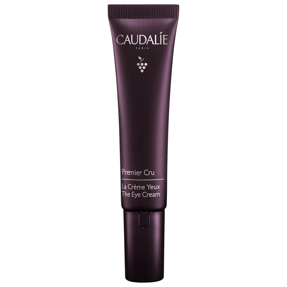 Caudalie Premier Cru eye cream application close-up smoothing the eye area