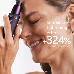 Caudalie Premier Cru serum texture on hand shows silky hydration.