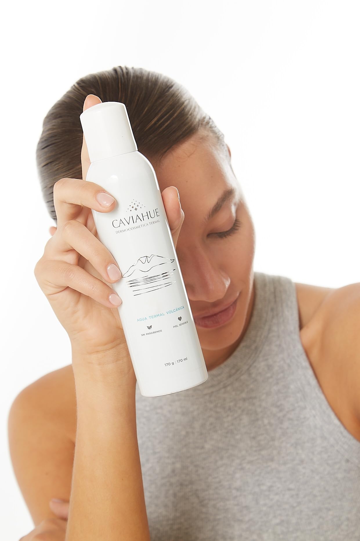 CAVIAHUE Caviahue bottle resting on vanity for daily hydrating mist