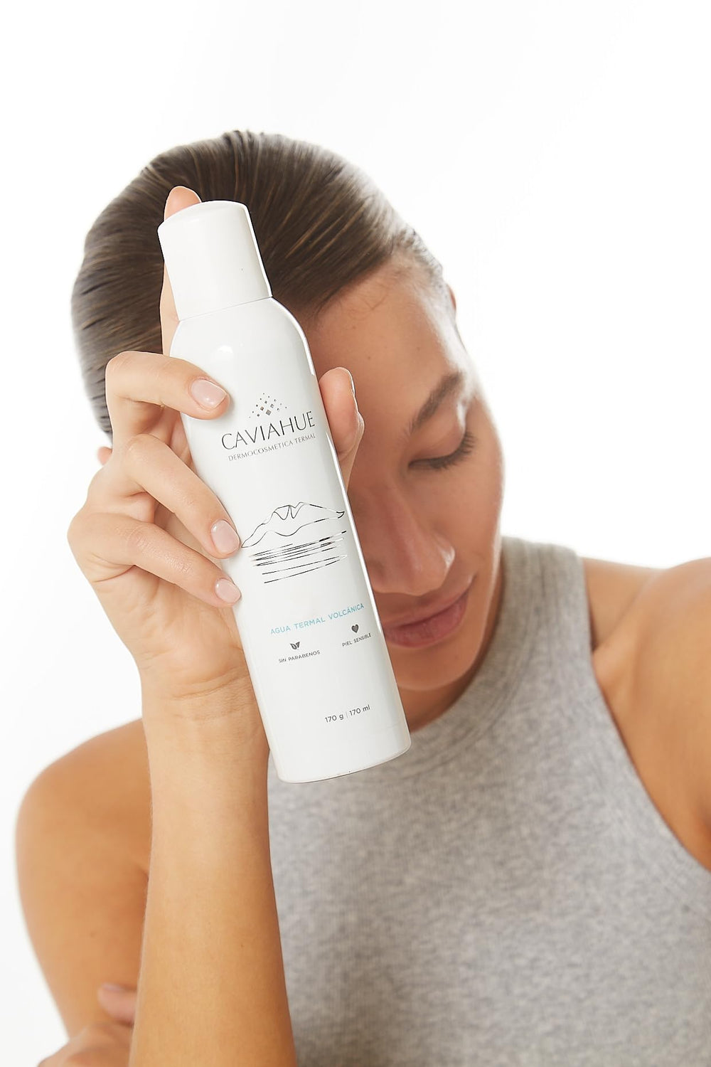 CAVIAHUE Caviahue bottle resting on vanity for daily hydrating mist
